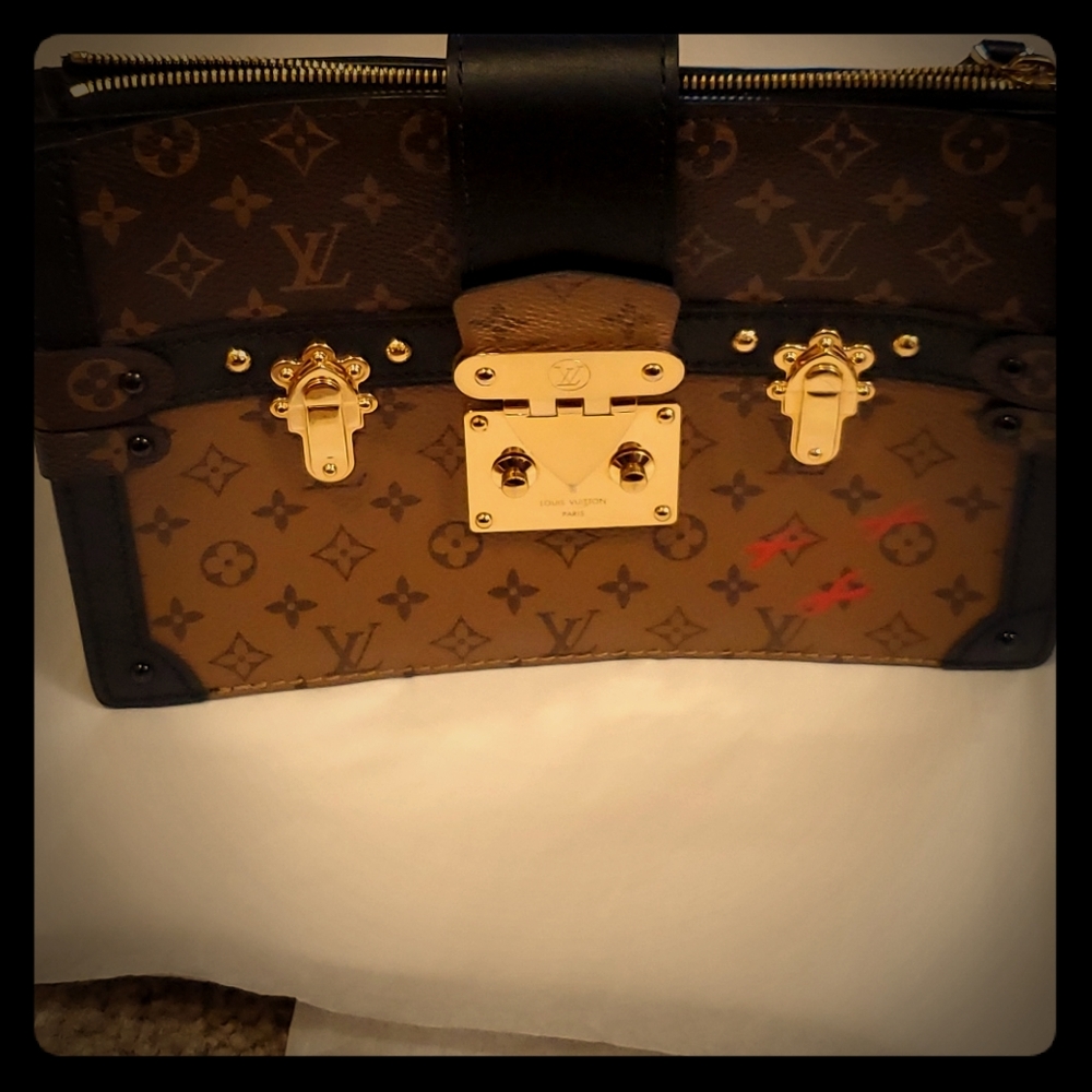 Louis Vuitton trunk clutch